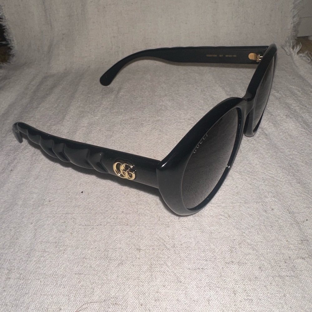 Gucci Women's Black Sunglasses with Gold Accent